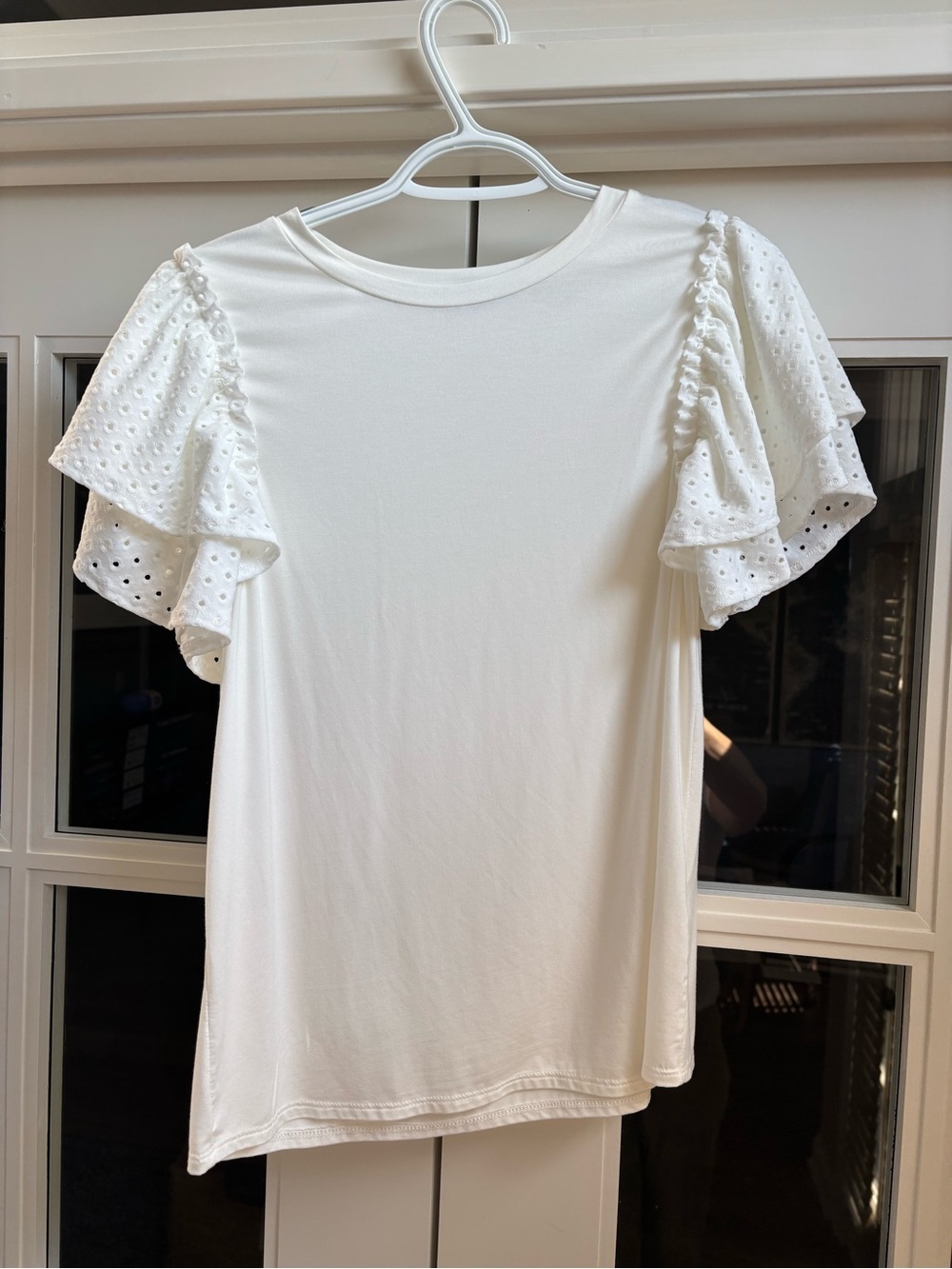 Cute winter white frill-sleeved top